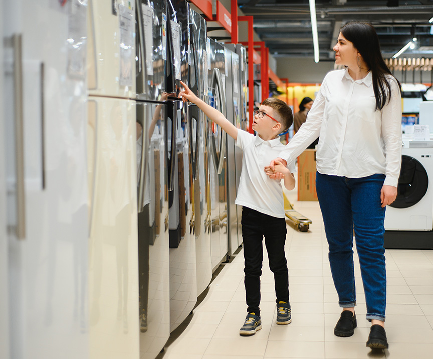 Man and woman shopping for appliances